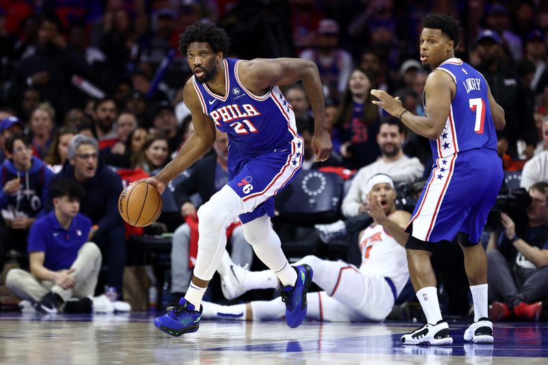 PHILADELPHIA, PENNSYLVANIA - APRIL 25: Joel Embiid #21 of the Philadelphia 76ers dribbles during the third quarter against the New York Knicks during game three of the Eastern Conference First Round Playoffs at the Wells Fargo Center on April 25, 2024 in Philadelphia, Pennsylvania. NOTE TO USER: User expressly acknowledges and agrees that, by downloading and/or using this Photograph, user is consenting to the terms and conditions of the Getty Images License Agreement. (Photo by Tim Nwachukwu/Getty Images)