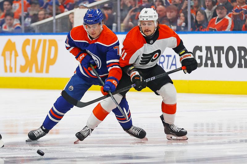 Jan 2, 2024; Edmonton, Alberta, CAN; Edmonton Oilers forward Ryan McLeod (71) battles for a loose puck against Philadelphia Flyers forward Travis Konecny (11) during the first period at Rogers Place. Mandatory Credit: Perry Nelson-USA TODAY Sports