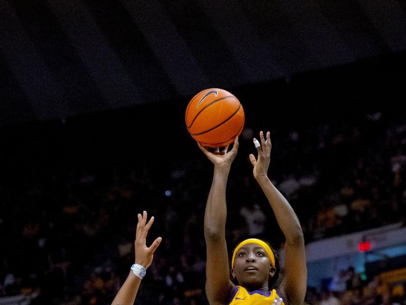 Mar 3, 2024; Baton Rouge, Louisiana, USA;  LSU Lady Tigers guard Flau'jae Johnson (4) shoots against Kentucky Wildcats guard Saniah Tyler (2) during the second half at Pete Maravich Assembly Center. Mandatory Credit: Matthew Hinton-USA TODAY Sports