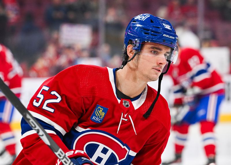 Oct 21, 2023; Montreal, Quebec, CAN; Montreal Canadiens defenseman Justin Barron (52) looks on during warm-up before the game against the Washington Capitals at Bell Centre. Mandatory Credit: David Kirouac-USA TODAY Sports