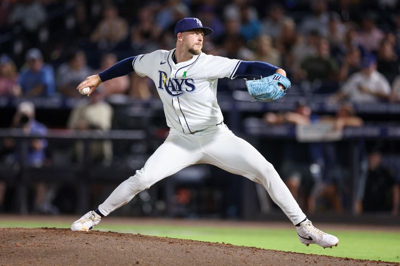 May 19, 2025; Tampa, Florida, USA; Tampa Bay Rays pitcher Eric Orze (17) throws a pitch against the Houston Astros in the eighth inning at George M. Steinbrenner Field. Mandatory Credit: Nathan Ray Seebeck-Imagn Images