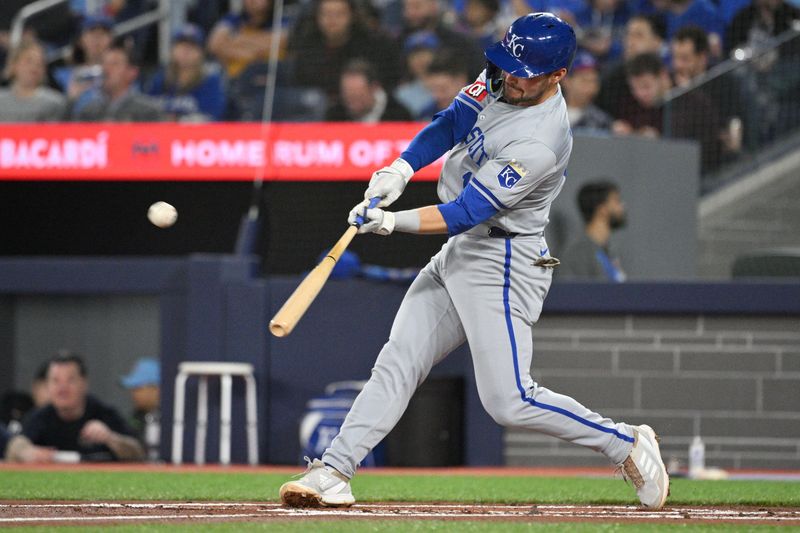 Apr 30, 2024; Toronto, Ontario, CAN;   Kansas City Royals second baseman Michael Massey (19) hits a two-run home run against the Toronto Blue Jays in the second inning at Rogers Centre. Mandatory Credit: Dan Hamilton-USA TODAY Sports