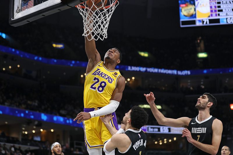 MEMPHIS, TENNESSEE - MARCH 27: Rui Hachimura #28 of the Los Angeles Lakers goes to the basket during the first half against the Memphis Grizzlies at FedExForum on March 27, 2024 in Memphis, Tennessee. NOTE TO USER: User expressly acknowledges and agrees that, by downloading and or using this photograph, User is consenting to the terms and conditions of the Getty Images License Agreement. (Photo by Justin Ford/Getty Images)