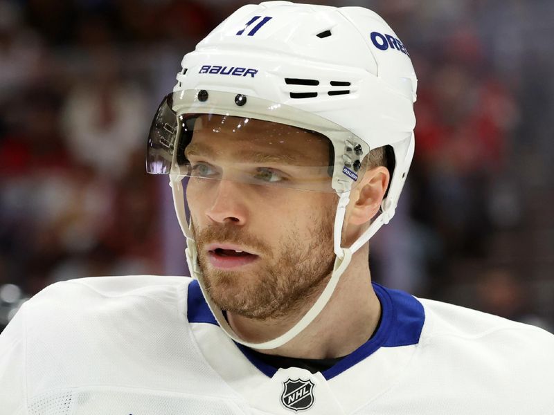 May 11, 2025; Sunrise, Florida, USA;Toronto Maple Leafs center Max Domi (11) against the Florida Panthers during the second period in game four of the second round of the 2025 Stanley Cup Playoffs at Amerant Bank Arena. Mandatory Credit: Kim Klement Neitzel-Imagn Images