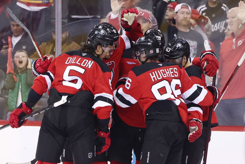 Oct 10, 2024; Newark, New Jersey, USA; New Jersey Devils right wing Timo Meier (28) celebrates his goal with teammates against the Toronto Maple Leafs during the second period at Prudential Center. Mandatory Credit: Ed Mulholland-Imagn Images