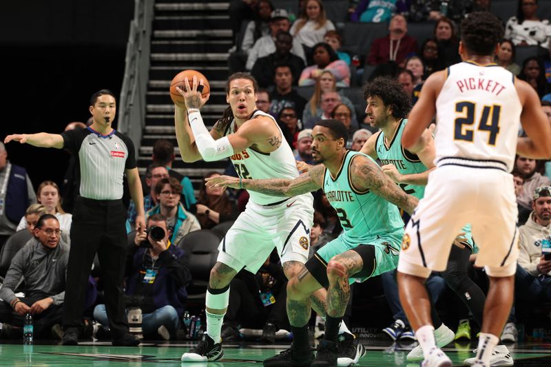 CHARLOTTE, NC - FEBRUARY 1:  Aaron Gordon #32 of the Denver Nuggets handles the ball during the game against the Charlotte Hornets on February 1, 2025 at Spectrum Center in Charlotte, North Carolina. NOTE TO USER: User expressly acknowledges and agrees that, by downloading and or using this photograph, User is consenting to the terms and conditions of the Getty Images License Agreement. Mandatory Copyright Notice: Copyright 2025 NBAE (Photo by Kent Smith/NBAE via Getty Images)