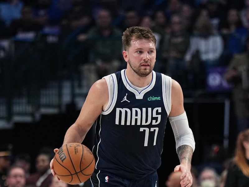 DALLAS, TX - MARCH 7: Luka Doncic #77 of the Dallas Mavericks dribbles the ball during the game against the Miami Heat on March 7, 2024 at the American Airlines Center in Dallas, Texas. NOTE TO USER: User expressly acknowledges and agrees that, by downloading and or using this photograph, User is consenting to the terms and conditions of the Getty Images License Agreement. Mandatory Copyright Notice: Copyright 2024 NBAE (Photo by Glenn James/NBAE via Getty Images)