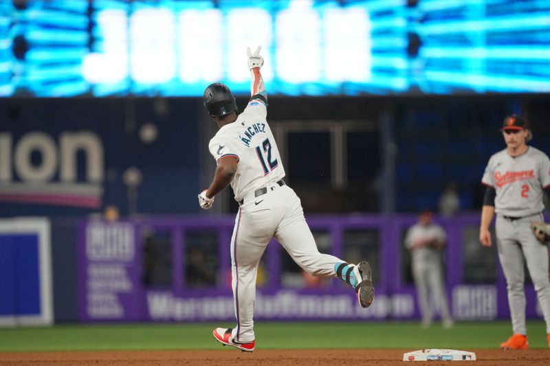 Jul 23, 2024; Miami, Florida, USA;  Miami Marlins right fielder Jesús Sánchez (12) rounds the bases after hitting a solo home run in the second inning against the Baltimore Orioles at loanDepot Park. Mandatory Credit: Jim Rassol-USA TODAY Sports