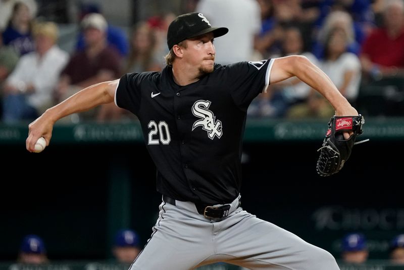 Jul 22, 2024; Arlington, Texas, USA; Chicago White Sox starting pitcher Erick Fedde (20) throws to the plate during the first inning against the Texas Rangers at Globe Life Field. Mandatory Credit: Raymond Carlin III-USA TODAY Sports