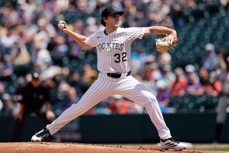 Apr 30, 2025; Denver, Colorado, USA; Colorado Rockies starting pitcher Chase Dollander (32) pitches in the second inning against the Atlanta Braves at Coors Field. Mandatory Credit: Isaiah J. Downing-Imagn Images