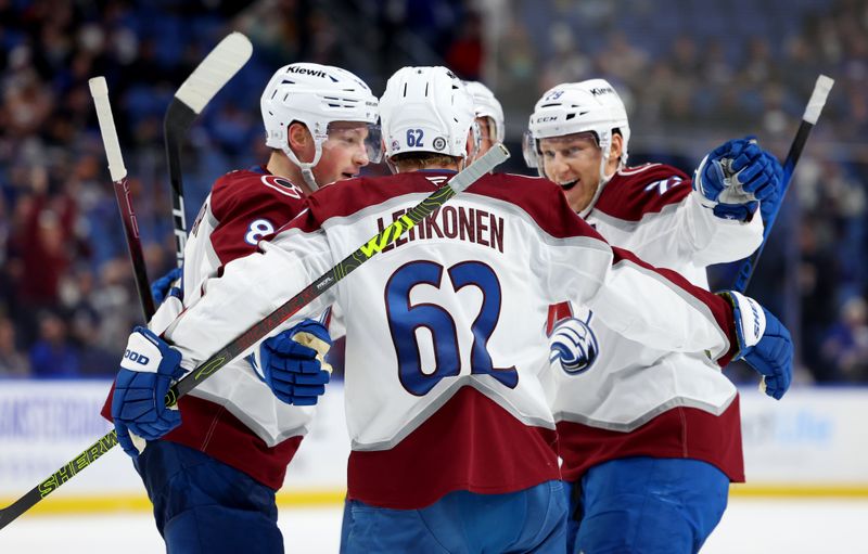 Dec 3, 2024; Buffalo, New York, USA;  Colorado Avalanche left wing Artturi Lehkonen (62) celebrates his goal with teammates during the third period against the Buffalo Sabres at KeyBank Center. Mandatory Credit: Timothy T. Ludwig-Imagn Images