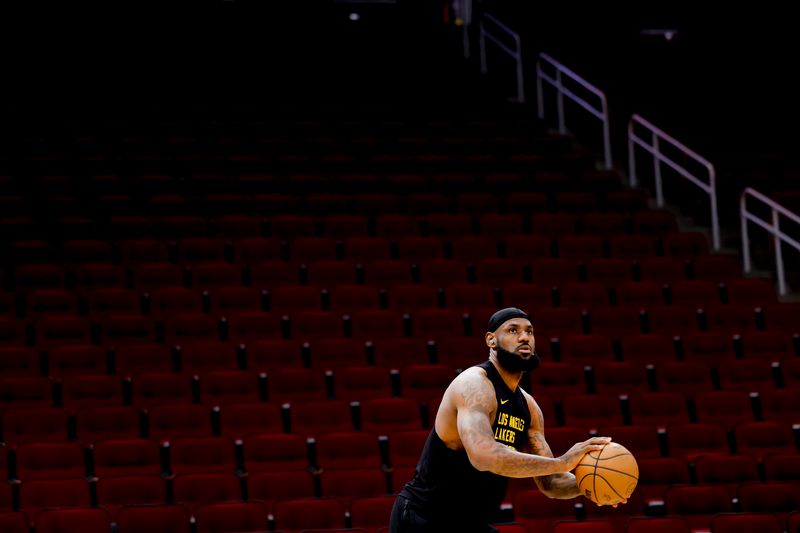 HOUSTON, TEXAS - NOVEMBER 08: LeBron James #23 of the Los Angeles Lakers warms up prior to facing the Houston Rockets at Toyota Center on November 08, 2023 in Houston, Texas. NOTE TO USER: User expressly acknowledges and agrees that, by downloading and or using this photograph, User is consenting to the terms and conditions of the Getty Images License Agreement.? (Photo by Carmen Mandato/Getty Images)