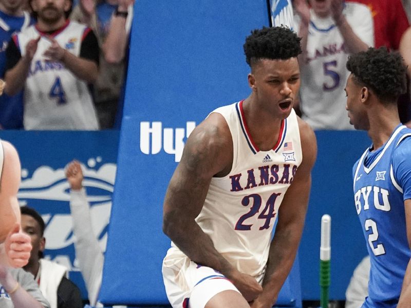 Feb 27, 2024; Lawrence, Kansas, USA; Kansas Jayhawks forward K.J. Adams Jr. (24) celebrates after scoring against the Brigham Young Cougars during the first half at Allen Fieldhouse. Mandatory Credit: Denny Medley-USA TODAY Sports