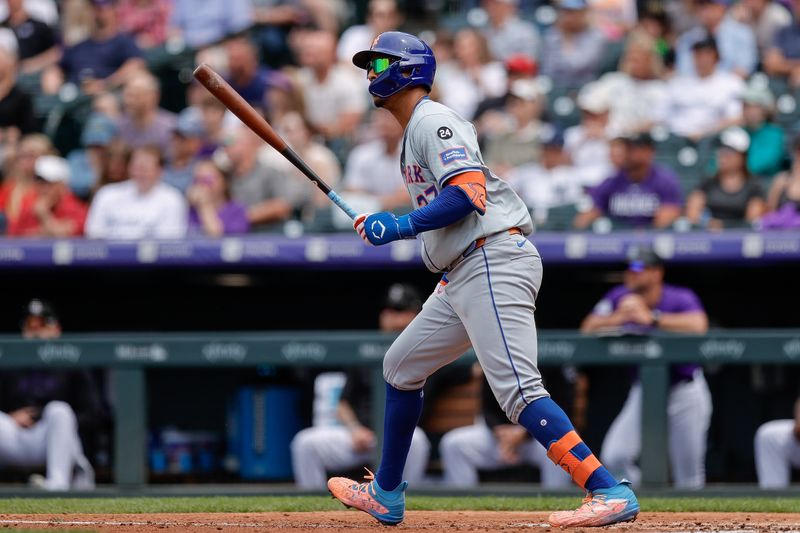 Aug 8, 2024; Denver, Colorado, USA; New York Mets third baseman Mark Vientos (27) watches his ball on a two run home run in the fifth inning against the Colorado Rockies at Coors Field. Mandatory Credit: Isaiah J. Downing-USA TODAY Sports