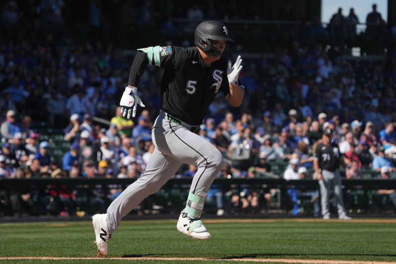 Feb 20, 2026; Mesa, Arizona, USA; Chicago White Sox third baseman Munetaka Murakami (5) hits against the Chicago Cubs in the first inning at Sloan Park. Mandatory Credit: Rick Scuteri-Imagn Images