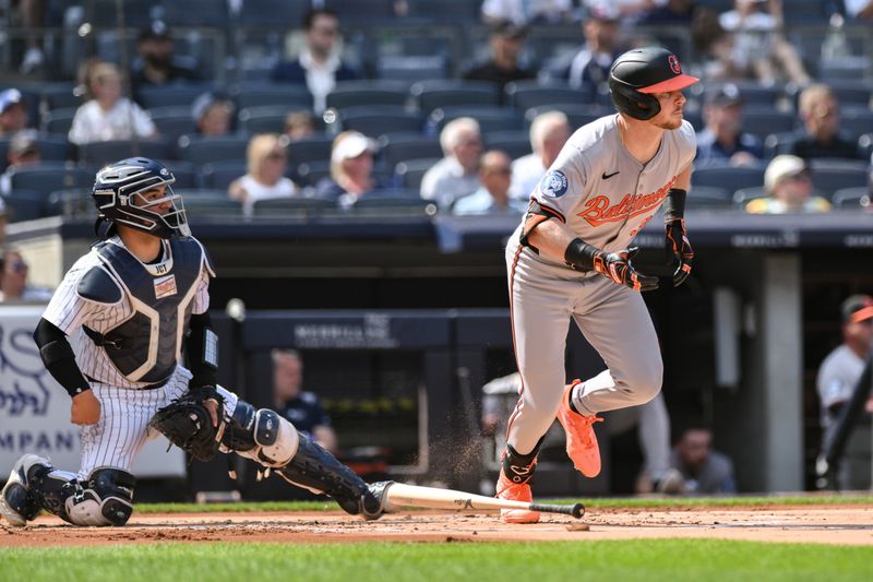 Jun 20, 2024; Bronx, New York, USA; Baltimore Orioles first baseman Ryan O'Hearn (32) hits a RBI single against the New York Yankees during the first inning at Yankee Stadium. Mandatory Credit: John Jones-USA TODAY Sports
