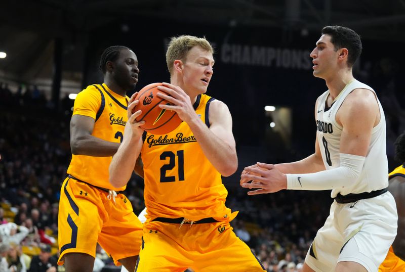 Feb 2, 2023; Boulder, Colorado, USA; California Golden Bears forward Lars Thiemann (21) grabs a rebound away from Colorado Buffaloes guard Luke O'Brien (0) in the first half at the CU Events Center. Mandatory Credit: Ron Chenoy-USA TODAY Sports