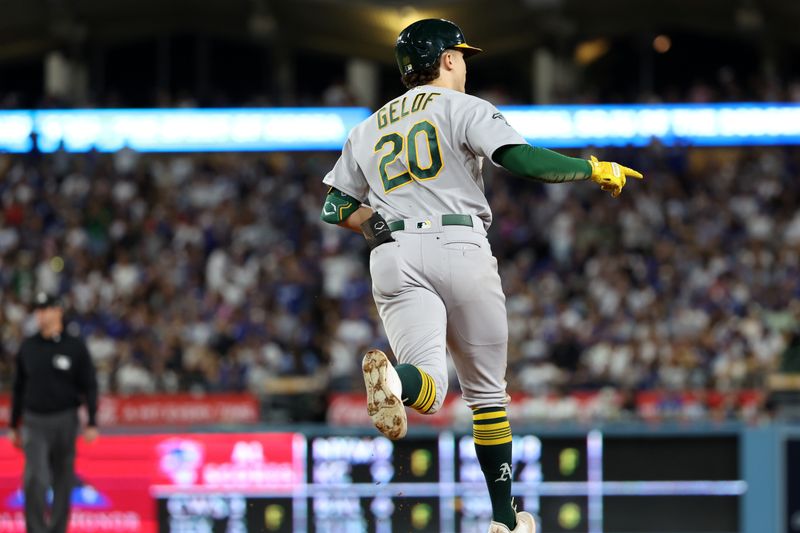 Aug 3, 2023; Los Angeles, California, USA;  Oakland Athletics second baseman Zack Gelof (20) runs around bases after hitting a home run during the sixth inning against the Los Angeles Dodgers at Dodger Stadium. Mandatory Credit: Kiyoshi Mio-USA TODAY Sports