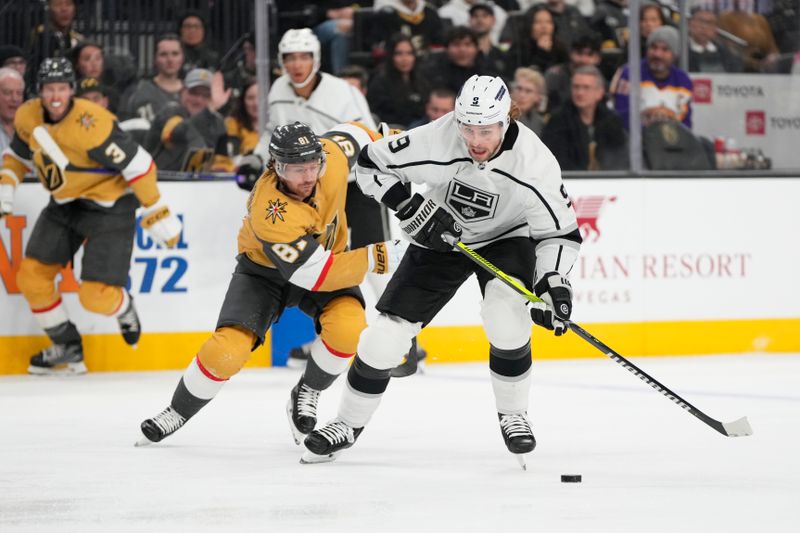 Dec 28, 2023; Las Vegas, Nevada, USA; Los Angeles Kings right wing Adrian Kempe (9) skates with the puck against Vegas Golden Knights center Jonathan Marchessault (81) during the first period at T-Mobile Arena. Mandatory Credit: Lucas Peltier-USA TODAY Sports