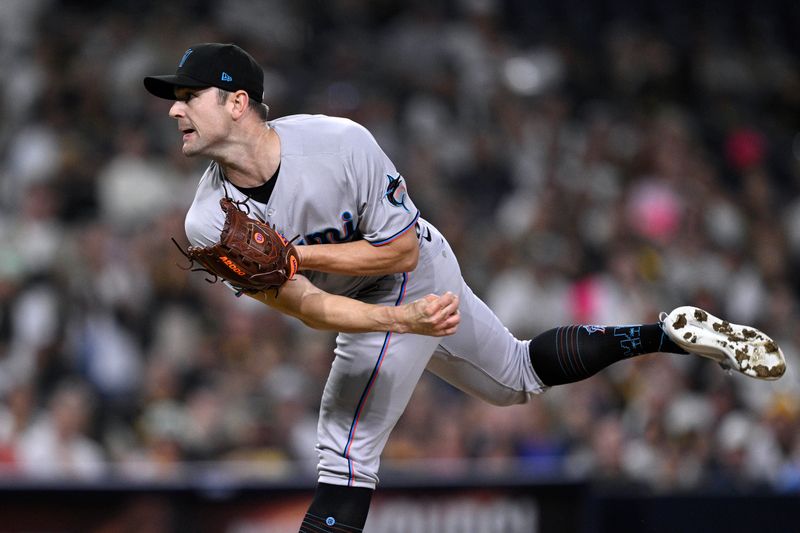 Aug 22, 2023; San Diego, California, USA; Miami Marlins relief pitcher David Robertson (19) throws a pitch against the San Diego Padres during the ninth inning at Petco Park. Mandatory Credit: Orlando Ramirez-USA TODAY Sports