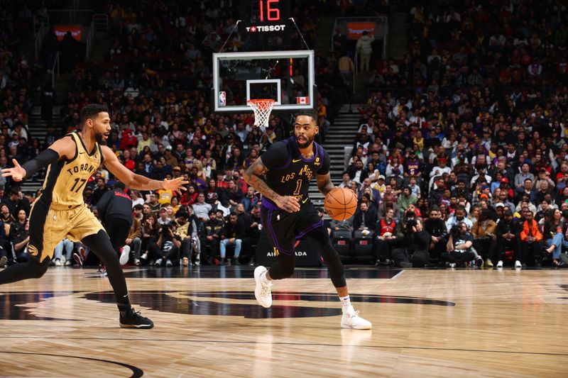 TORONTO, CANADA - APRIL 2: D'Angelo Russell #1 of the Los Angeles Lakers dribbles the ball during the game against the Toronto Raptors on April 2, 2024 at the Scotiabank Arena in Toronto, Ontario, Canada.  NOTE TO USER: User expressly acknowledges and agrees that, by downloading and or using this Photograph, user is consenting to the terms and conditions of the Getty Images License Agreement.  Mandatory Copyright Notice: Copyright 2023 NBAE (Photo by Vaughn Ridley/NBAE via Getty Images)