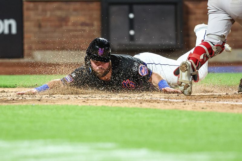 Sep 2, 2024; New York City, New York, USA;  New York Mets left fielder DJ Stewart (29) slides safely into home plate in the fourth inning against the Boston Red Sox at Citi Field. Mandatory Credit: Wendell Cruz-USA TODAY Sports