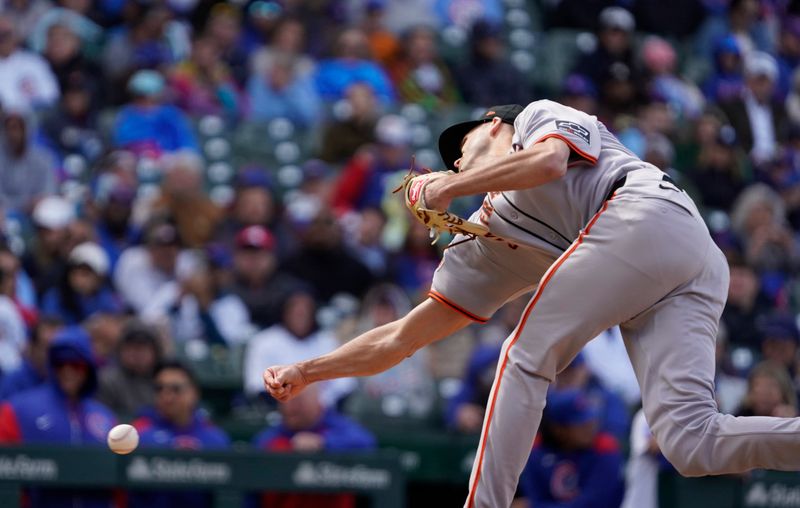 May 7, 2025; Chicago, Illinois, USA; San Francisco Giants pitcher Tyler Rogers (71) throws the ball against the Chicago Cubs during the eighth inning at Wrigley Field. Mandatory Credit: David Banks-Imagn Images