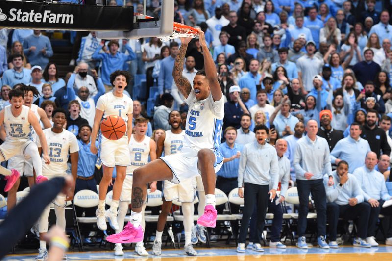 Feb 3, 2024; Chapel Hill, North Carolina, USA; North Carolina Tar Heels forward Armando Bacot (5) scores in the second half at Dean E. Smith Center. Mandatory Credit: Bob Donnan-USA TODAY Sports