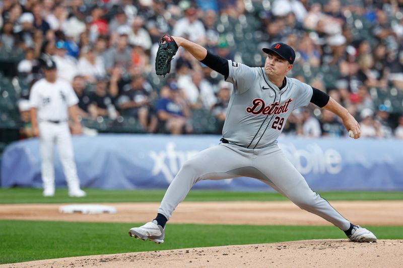 Aug 24, 2024; Chicago, Illinois, USA; Detroit Tigers starting pitcher Tarik Skubal (29) delivers a pitch against the Chicago White Sox during the first inning at Guaranteed Rate Field. Mandatory Credit: Kamil Krzaczynski-USA TODAY Sports