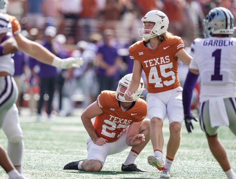 Nov 4, 2023; Austin, Texas, USA; Texas Longhorns place kicker Bert Auburn (45) looks follows the ball through the goal posts against the Kansas State Wildcats in the second half at Darrell K Royal-Texas Memorial Stadium. Mandatory Credit: Ricardo B. Brazziell-USA TODAY Sports