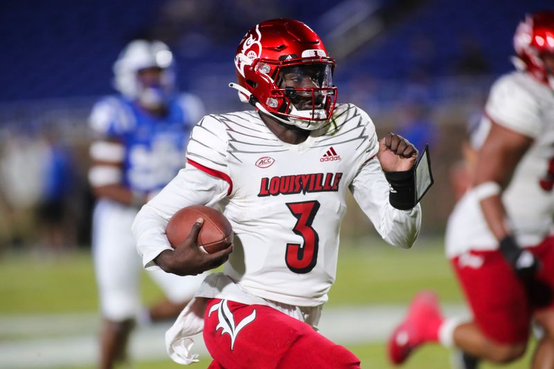 Nov 18, 2021; Durham, North Carolina, USA;  Louisville Cardinals quarterback Malik Cunningham (3) runs with the ball to score a touchdown during the 1st half of the game against the Louisville Cardinals at Wallace Wade Stadium. Mandatory Credit: Jaylynn Nash-USA TODAY Sports