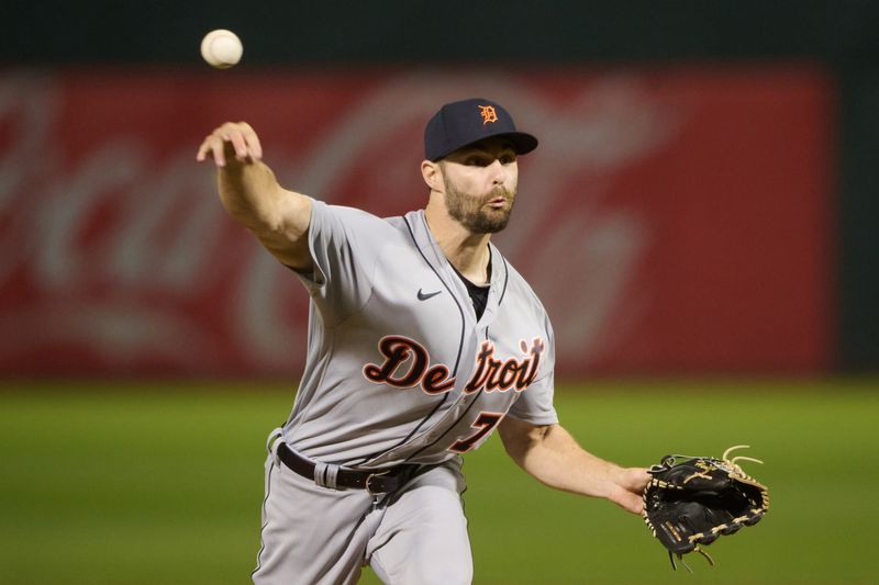 Sep 21, 2023; Oakland, California, USA; Detroit Tigers pitcher Brenan Hanifee (75) throws a pitch against the Oakland Athletics in his major league debut during the ninth inning at Oakland-Alameda County Coliseum. Mandatory Credit: Robert Edwards-USA TODAY Sports