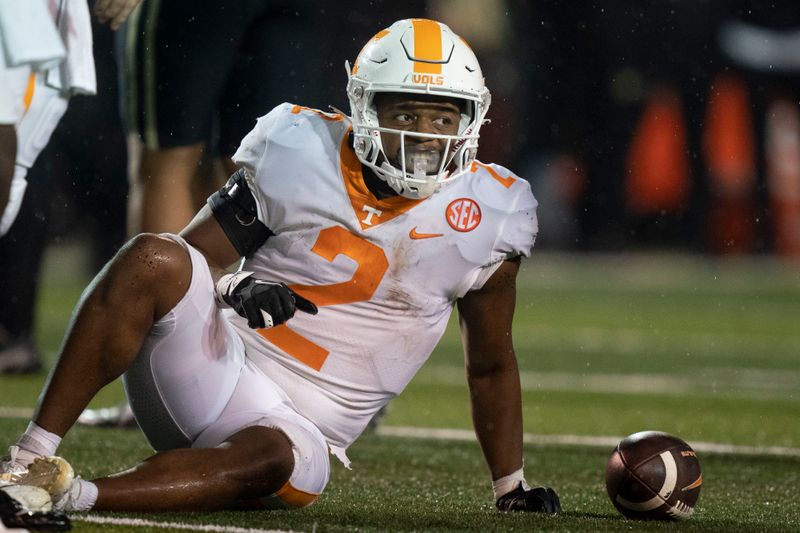 Nov 26, 2022; Nashville, Tennessee, USA;   
Tennessee Volunteers running back Jabari Small (2) sits on the turf after suffering an apparent injury during the second quarter against the Vanderbilt Commodores at FirstBank Stadium. Mandatory Credit: George Walker IV - USA TODAY Sports