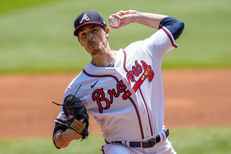 Apr 23, 2023; Cumberland, Georgia, USA; Atlanta Braves starting pitcher Max Fried (54) pitches against the Houston Astros during the first inning at Truist Park. Mandatory Credit: Dale Zanine-USA TODAY Sports