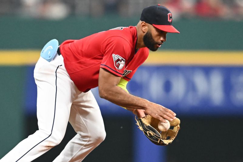 Jun 7, 2023; Cleveland, Ohio, USA; Cleveland Guardians shortstop Amed Rosario (1) fields a ball hit by Boston Red Sox designated hitter Justin Turner (not pictured) during the eighth inning at Progressive Field. Mandatory Credit: Ken Blaze-USA TODAY Sports