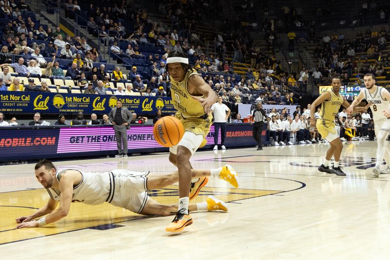 Feb 4, 2026; Berkeley, California, USA; California Golden Bears forward John Camden (2) falls to the floor as Georgia Tech Yellow Jackets guard Akai Fleming (0) steals the inbound pass during the second half at Haas Pavilion. Mandatory Credit: D. Ross Cameron-Imagn Images