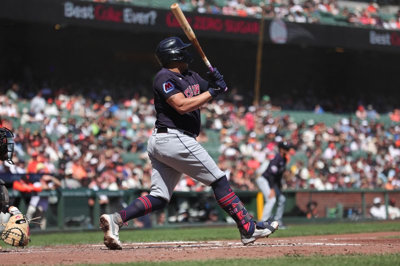 Sep 13, 2023; San Francisco, California, USA; Cleveland Guardians first baseman Josh Naylor (22) hits an RBI single during the second inning against the San Francisco Giants at Oracle Park. Mandatory Credit: Sergio Estrada-USA TODAY Sports