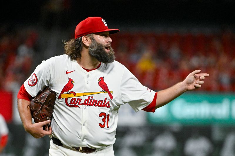 Sep 17, 2024; St. Louis, Missouri, USA;  St. Louis Cardinals starting pitcher Lance Lynn (31) reacts as he walks off the field after the sixth inning against the Pittsburgh Pirates at Busch Stadium. Mandatory Credit: Jeff Curry-Imagn Images