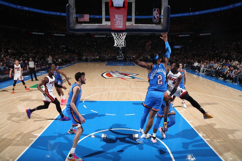 OKLAHOMA CITY, OK - MARCH 8:  Terry Rozier #2 of the Miami Heat passes the ball during the game against the Oklahoma City Thunder on March 8, 2024 at Paycom Arena in Oklahoma City, Oklahoma. NOTE TO USER: User expressly acknowledges and agrees that, by downloading and or using this photograph, User is consenting to the terms and conditions of the Getty Images License Agreement. Mandatory Copyright Notice: Copyright 2024 NBAE (Photo by Zach Beeker/NBAE via Getty Images)