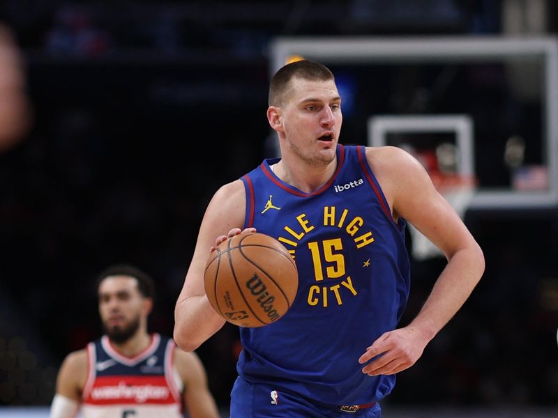 WASHINGTON, DC - JANUARY 21: Nikola Jokic #15 of the Denver Nuggets dribbles against the Washington Wizards at Capital One Arena on January 21, 2024 in Washington, DC. NOTE TO USER: User expressly acknowledges and agrees that, by downloading and or using this photograph, User is consenting to the terms and conditions of the Getty Images License Agreement. (Photo by Patrick Smith/Getty Images)