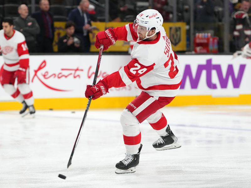 Jan 19, 2023; Las Vegas, Nevada, USA; Detroit Red Wings center Pius Suter (24) warms up before a game against the Vegas Golden Knights at T-Mobile Arena. Mandatory Credit: Stephen R. Sylvanie-USA TODAY Sports