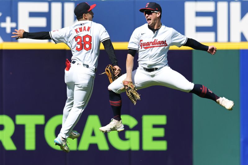 Apr 25, 2024; Cleveland, Ohio, USA; Cleveland Guardians left fielder Steven Kwan (38) and center fielder Tyler Freeman (2) celebrate after the Guardians beat the Boston Red Sox at Progressive Field. Mandatory Credit: Ken Blaze-USA TODAY Sports