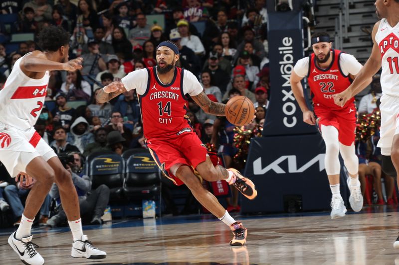 NEW ORLEANS, LA - FEBRUARY 5: Brandon Ingram #14 of the New Orleans Pelicans dribbles the ball during the game against the Toronto Raptors on February 5, 2024 at the Smoothie King Center in New Orleans, Louisiana. NOTE TO USER: User expressly acknowledges and agrees that, by downloading and or using this Photograph, user is consenting to the terms and conditions of the Getty Images License Agreement. Mandatory Copyright Notice: Copyright 2024 NBAE (Photo by Layne Murdoch Jr./NBAE via Getty Images)