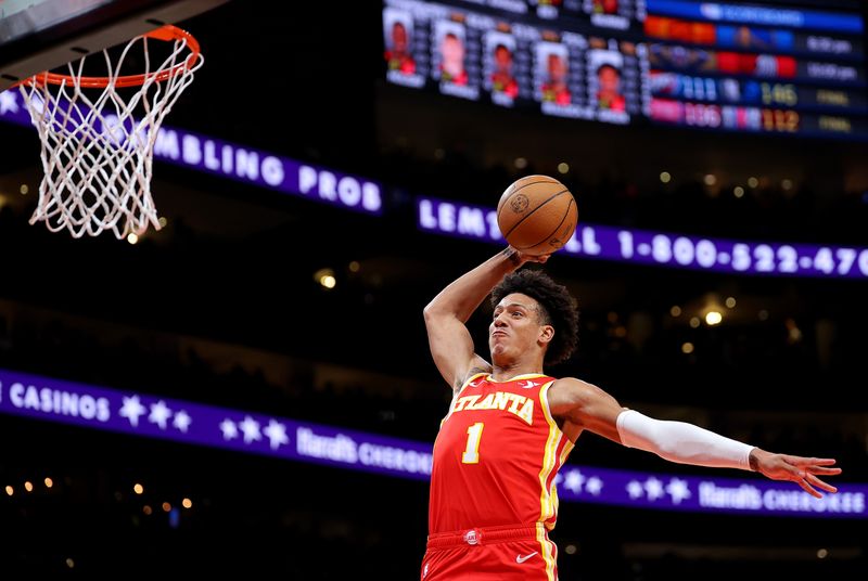 ATLANTA, GEORGIA - FEBRUARY 10:  Jalen Johnson #1 of the Atlanta Hawks dunks against the Houston Rockets during the first quarter at State Farm Arena on February 10, 2024 in Atlanta, Georgia.  NOTE TO USER: User expressly acknowledges and agrees that, by downloading and/or using this photograph, user is consenting to the terms and conditions of the Getty Images License Agreement.  (Photo by Kevin C. Cox/Getty Images)