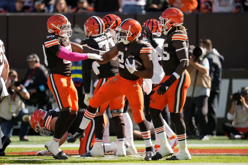 Cleveland Browns running back Nick Chubb (24) celebrates his touchdown in the first half of an NFL football game against the Cincinnati Bengals, Sunday, Oct. 20, 2024, in Cleveland. (AP Photo/Sue Ogrocki)