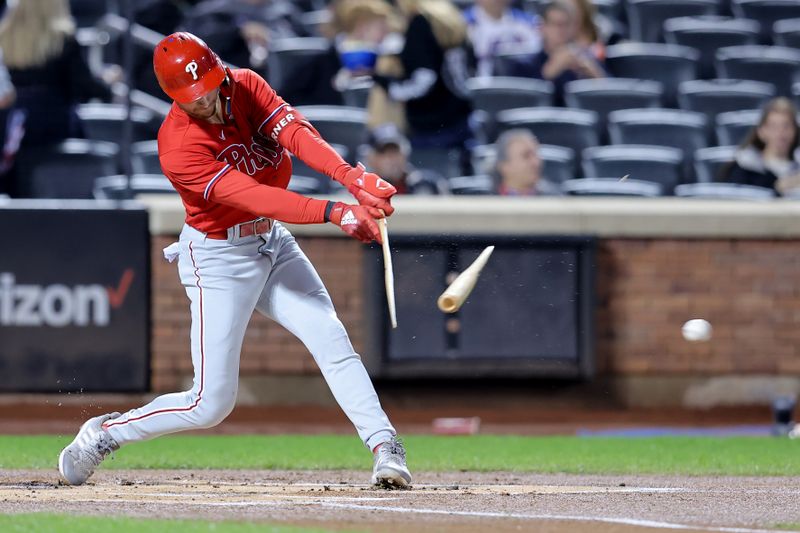 Sep 30, 2023; New York City, New York, USA; Philadelphia Phillies shortstop Trea Turner (7) breaks his bat on an infield single against the New York Mets during the first inning at Citi Field. Mandatory Credit: Brad Penner-USA TODAY Sports