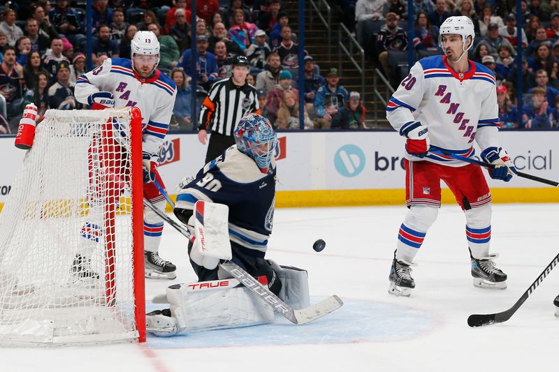 Feb 25, 2024; Columbus, Ohio, USA; Columbus Blue Jackets goalie Elvis Merzlikins (90) makes a save against the New York Rangers during the third period at Nationwide Arena. Mandatory Credit: Russell LaBounty-USA TODAY Sports