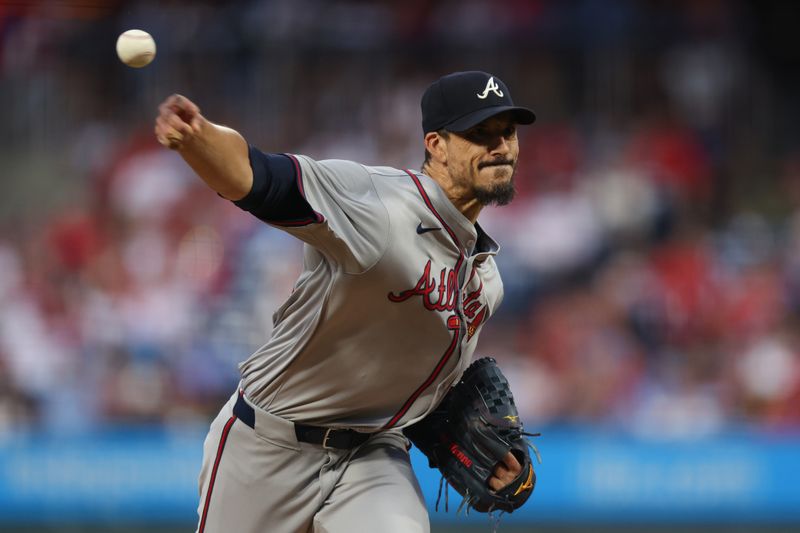 Aug 29, 2024; Philadelphia, Pennsylvania, USA; Atlanta Braves pitcher Charlie Morton (50) throws a pitch during the first inning against the Philadelphia Phillies at Citizens Bank Park. Mandatory Credit: Bill Streicher-USA TODAY Sports