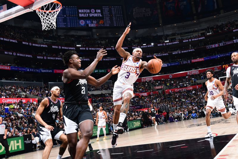 LOS ANGELES, CA - APRIL 10: Bradley Beal #3 of the Phoenix Suns grabs the rebound during the game against the LA Clippers on April 10, 2024 at Crypto.Com Arena in Los Angeles, California. NOTE TO USER: User expressly acknowledges and agrees that, by downloading and/or using this Photograph, user is consenting to the terms and conditions of the Getty Images License Agreement. Mandatory Copyright Notice: Copyright 2024 NBAE (Photo by Adam Pantozzi/NBAE via Getty Images)