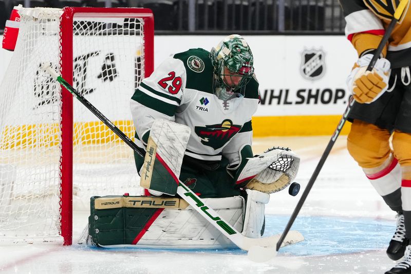 Apr 12, 2024; Las Vegas, Nevada, USA; Minnesota Wild goaltender Marc-Andre Fleury (29) makes a save against the Vegas Golden Knights during the second period at T-Mobile Arena. Mandatory Credit: Stephen R. Sylvanie-USA TODAY Sports